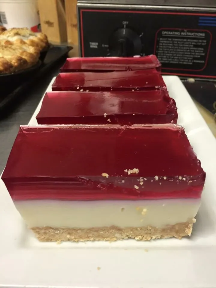 A vivid, glossy dessert served at the cafe.